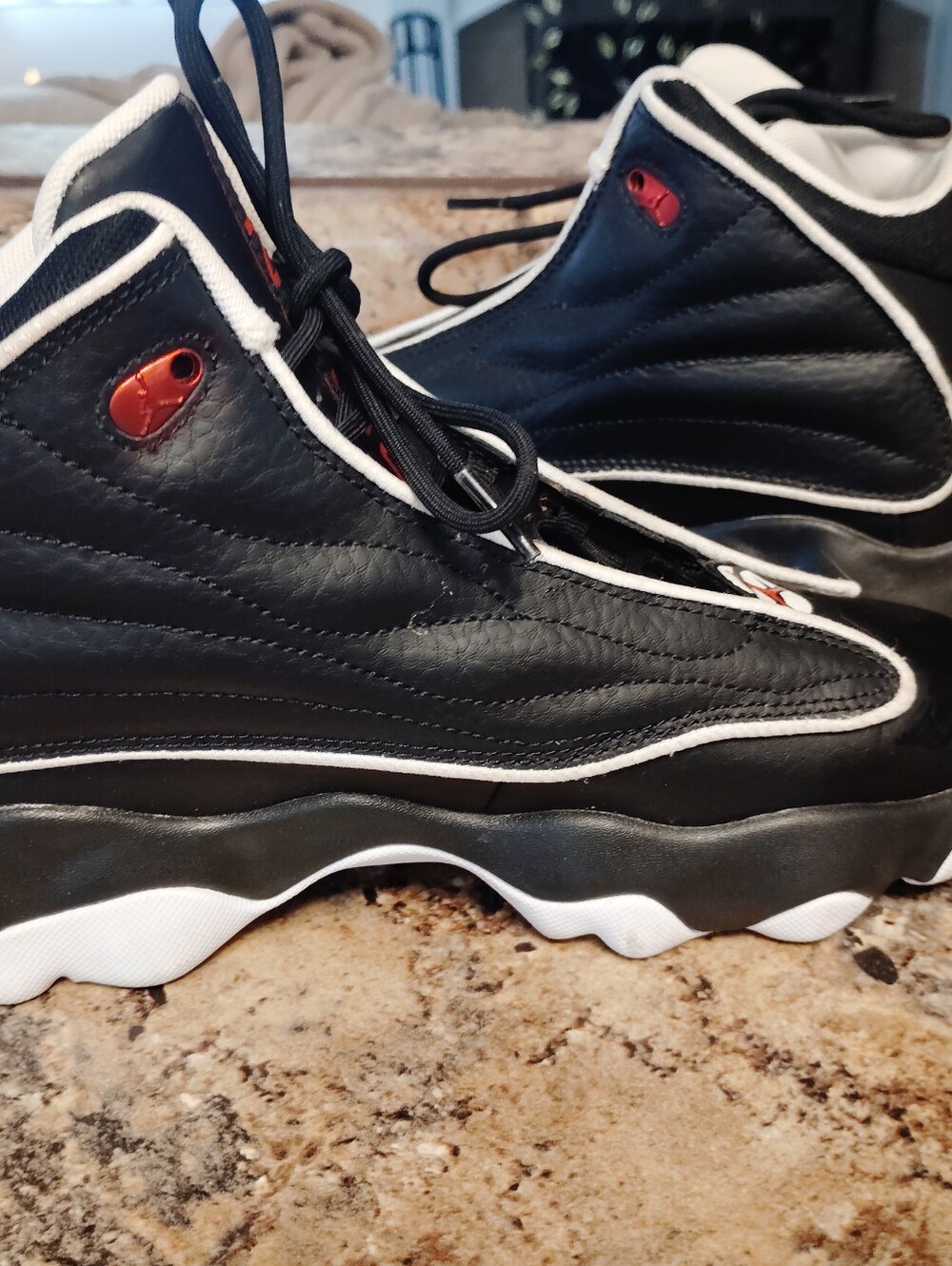 Jordan Kids Black and Orange High-Top Sneakers